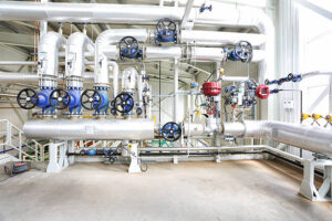modern and new boiler room equipment with many instruments of measurement.
